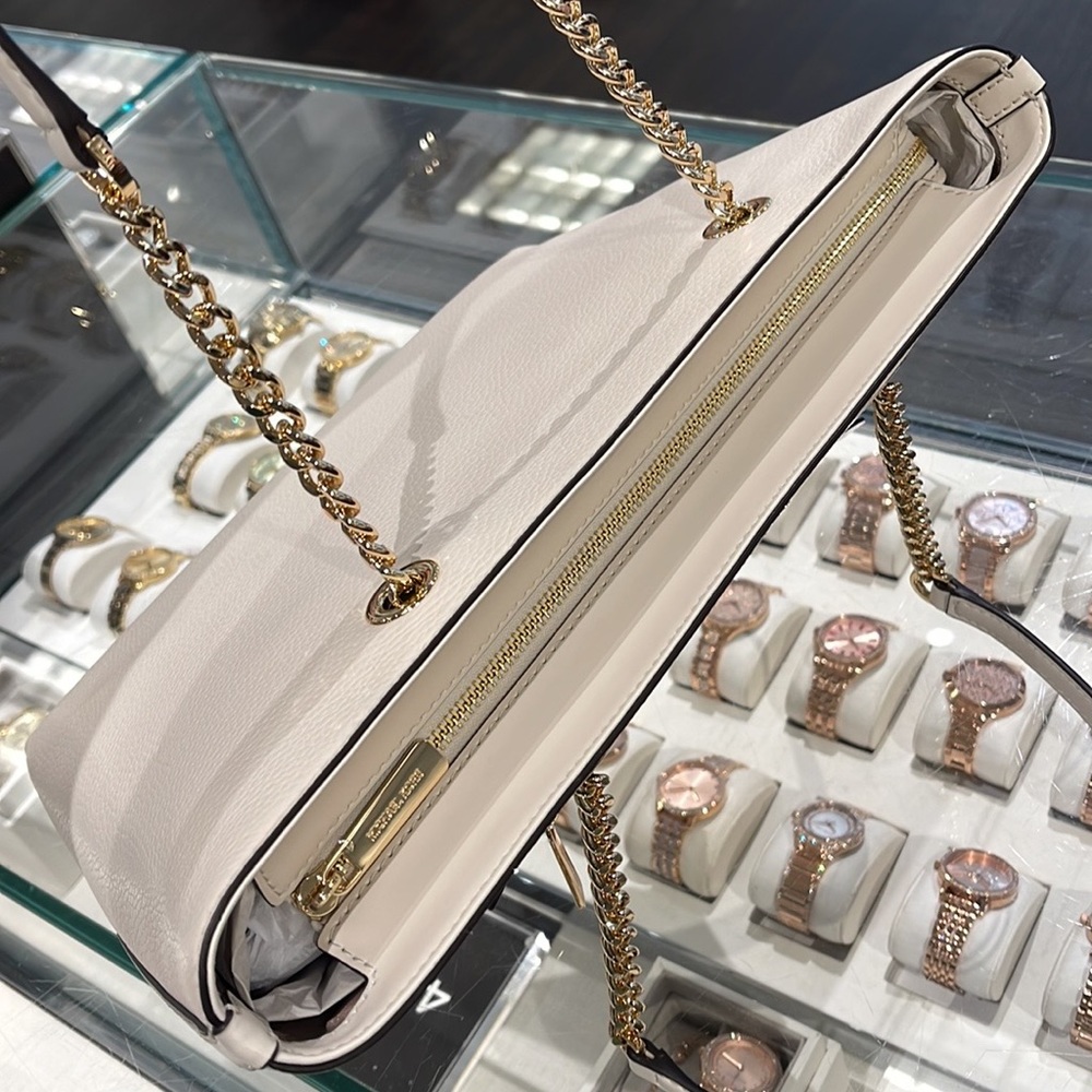 MICHAEL KORS
Jet Set Medium Front Zip Pebbled Leather Chain Tote Bag
Light Cream - Picture 12 of 16